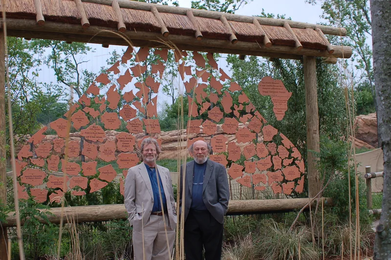 Nashville Zoo at Grassmere, Arnold and Steve Bach in front of the installed wall